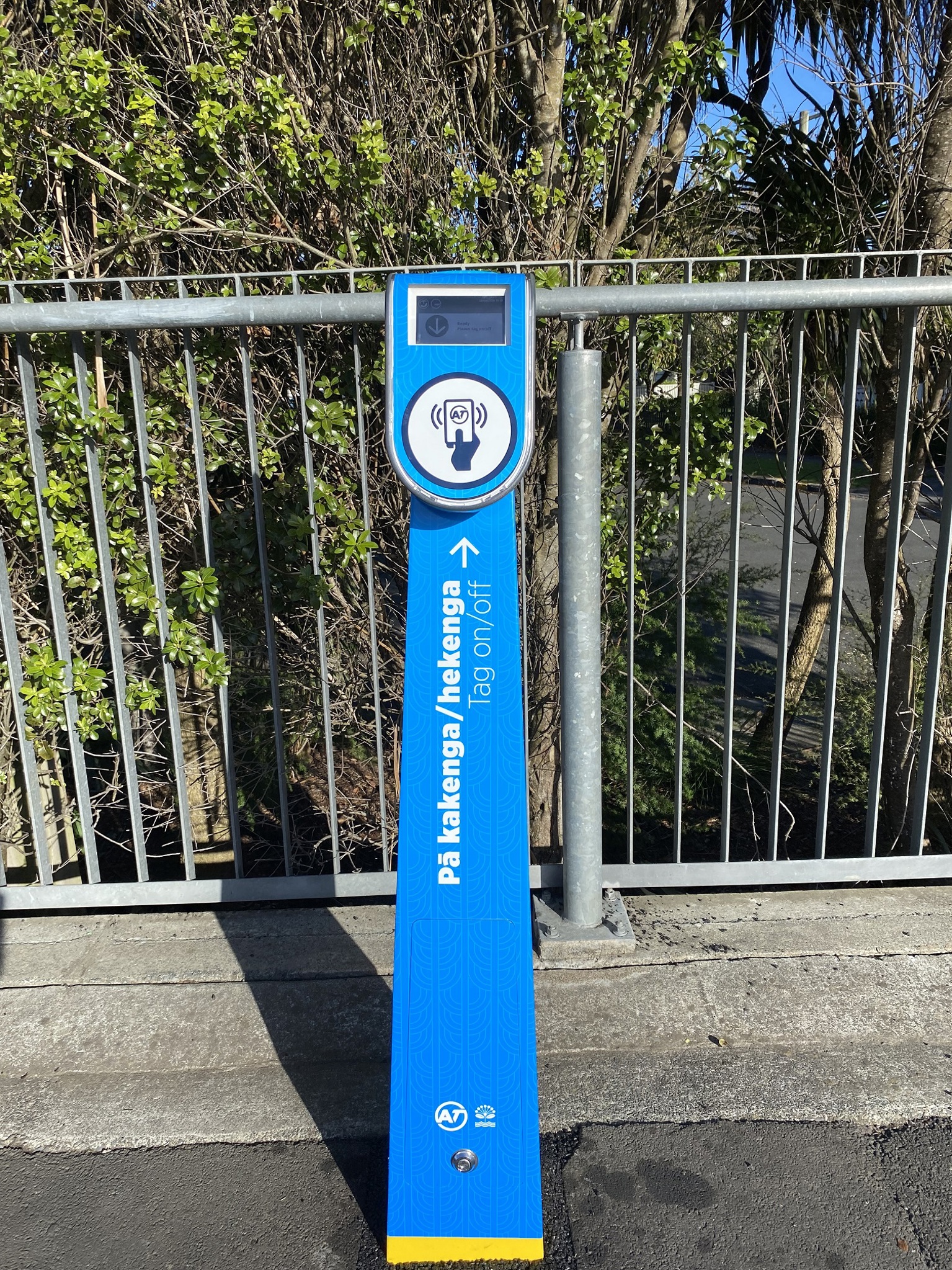 Photo of pillar-style card reader outside a train station